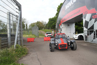 ( Caterham grey with red nose stripe )
